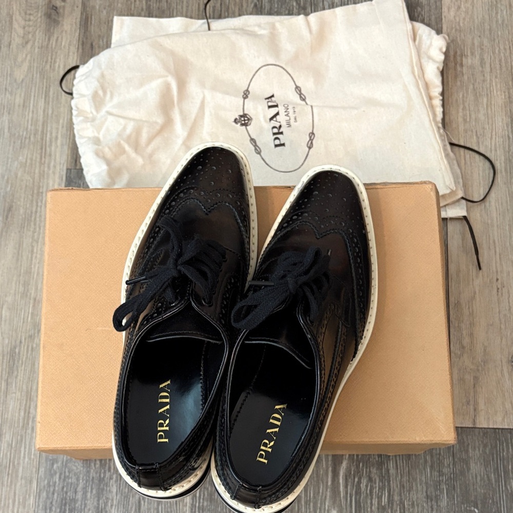 Prada Woman’s Black and White Oxford Shoes